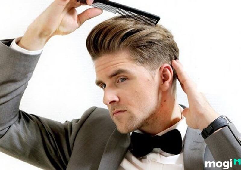 Kiểu tóc undercut với phần mái vuốt ngược là kiểu tóc hoàn hảo cho các quý ông trán thấp.