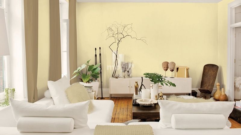 Mẫu phòng khách đẹp với tường màu vàng nhạt hợp bản mệnh người mệnh Thổ