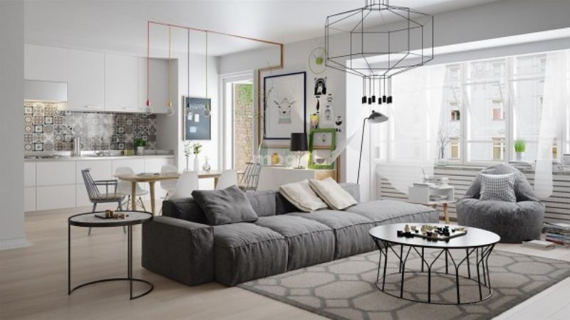Đặc trưng phong cách Scandinavian trong thiết kế mẫu phòng khách là sofa gam màu trung tính, bàn gỗ sáng màu 